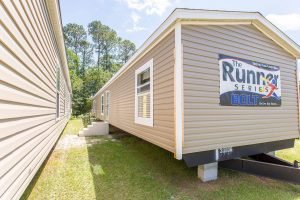 Showing Bolt model in mobile home sales gallery display