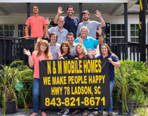 Featuring team members at mobile homes dealership