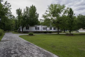 Showing one eighth acre land home with exterior view