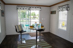 Displaying tiny home kitchen with efficient cabinet space