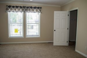 Featuring bedroom interior in four bedroom home layout