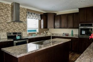 Showing double island kitchen with cabinet storage