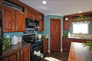 Featuring Live Oak kitchen with deluxe cabinet finishes