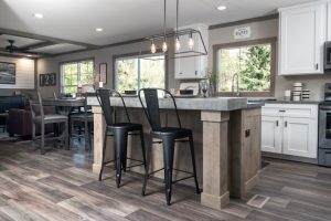 Showing farmhouse kitchen layout with upgraded counters