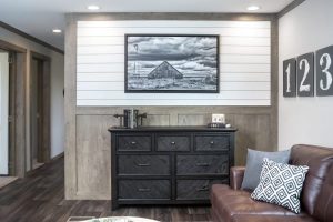 Showing spacious farmhouse living room with open layout