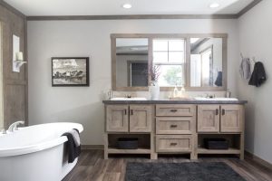 Displaying spacious farmhouse master bath with upgraded finish