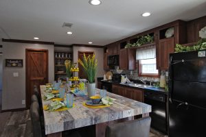 Featuring rustic kitchen island and pantry cabinet space