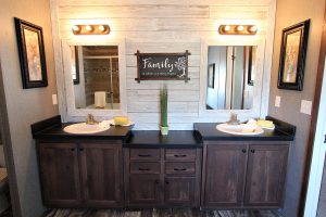 Showing upgraded master bathroom in rustic double wide