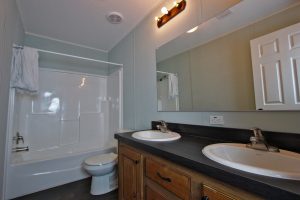 Displaying Kahuna spare bath with upgraded residential fixtures