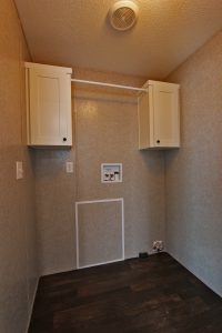 Featuring Naples laundry room with utility storage