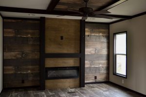 Showing open concept room with fireplace feature