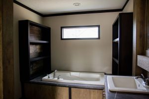 Displaying rustic kitchen with wood style cabinets
