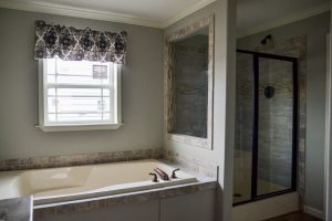 Displaying four bedroom home with double fireplace