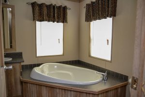 Displaying manufactured home interior with open concept