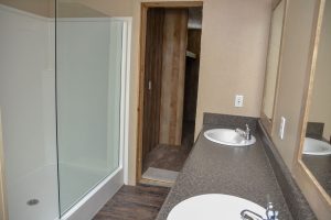 Showing manufactured home hallway with connected rooms