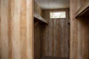 Displaying manufactured home bedroom with walk in closet