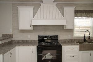 Showing country style kitchen with residential appeal