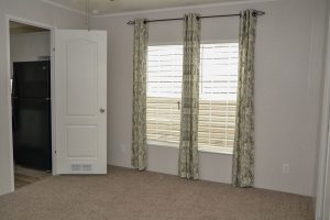 Displaying kitchen layout with white cabinet finishes