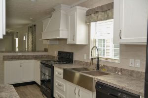Showing country kitchen with spacious open floor plan