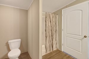Displaying Ridgeville residential home with natural setting