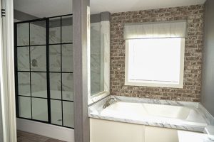 Showing Roadrunner kitchen with modern cabinetry and finishes