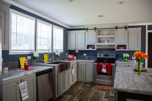 Showing Willet hybrid home exterior with metal roof design