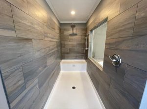 Showing Mallard pass through bar and kitchen area design