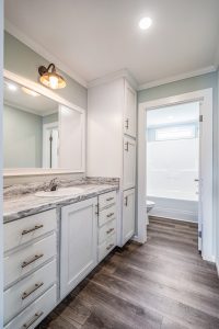Highlighting Mallard bathroom vanity with upgraded fixtures