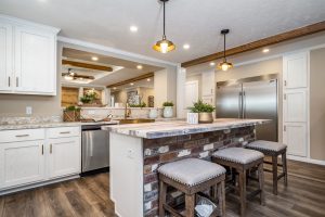 Featuring Mallard kitchen cabinetry and pass through bar