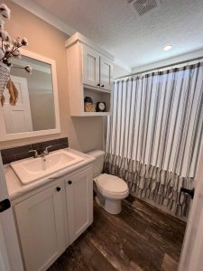 Showing comfortable bedroom layout in ScotBilt home