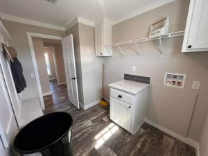 Displaying open living area inside ScotBilt manufactured home