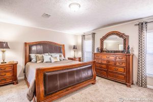 Featuring elegant bedroom finishes in Stagecoach home