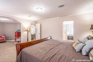 Displaying upgraded bedroom interior in Stagecoach home
