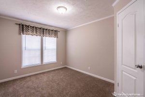 Displaying private master bedroom inside Stagecoach home
