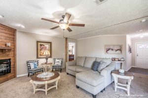 Highlighting spacious seating area in Stagecoach home