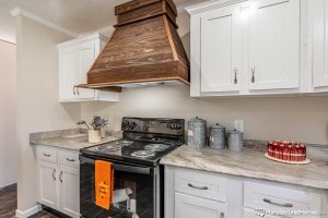 Displaying modern kitchen appliances in Stagecoach home