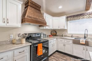 Showing upgraded kitchen finishes inside Stagecoach home