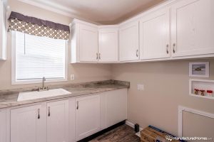 Highlighting utility room cabinetry in Stagecoach home