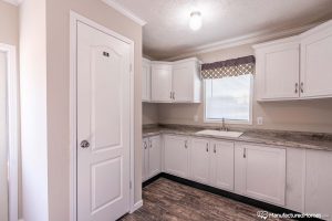 Showing spacious utility room inside Kabco Stagecoach home
