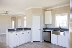 Featuring upgraded kitchen finishes in modern mobile home