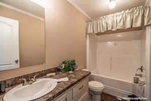 Displaying luxury bathroom with upgraded residential fixtures