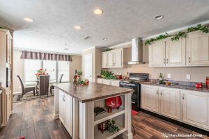 Displaying custom kitchen island inside manufactured home