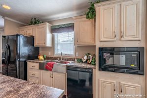 Showing modern kitchen layout with upgraded cabinetry features